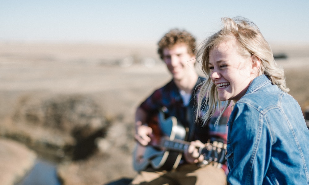 couple playing music on a date